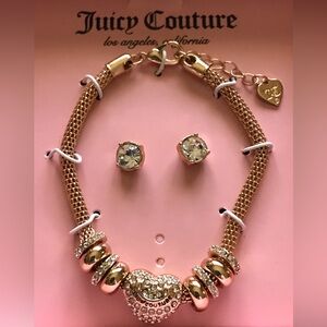 Juicy Couture Los Angeles Cal heart pendent 4rings on each side of the bracelet